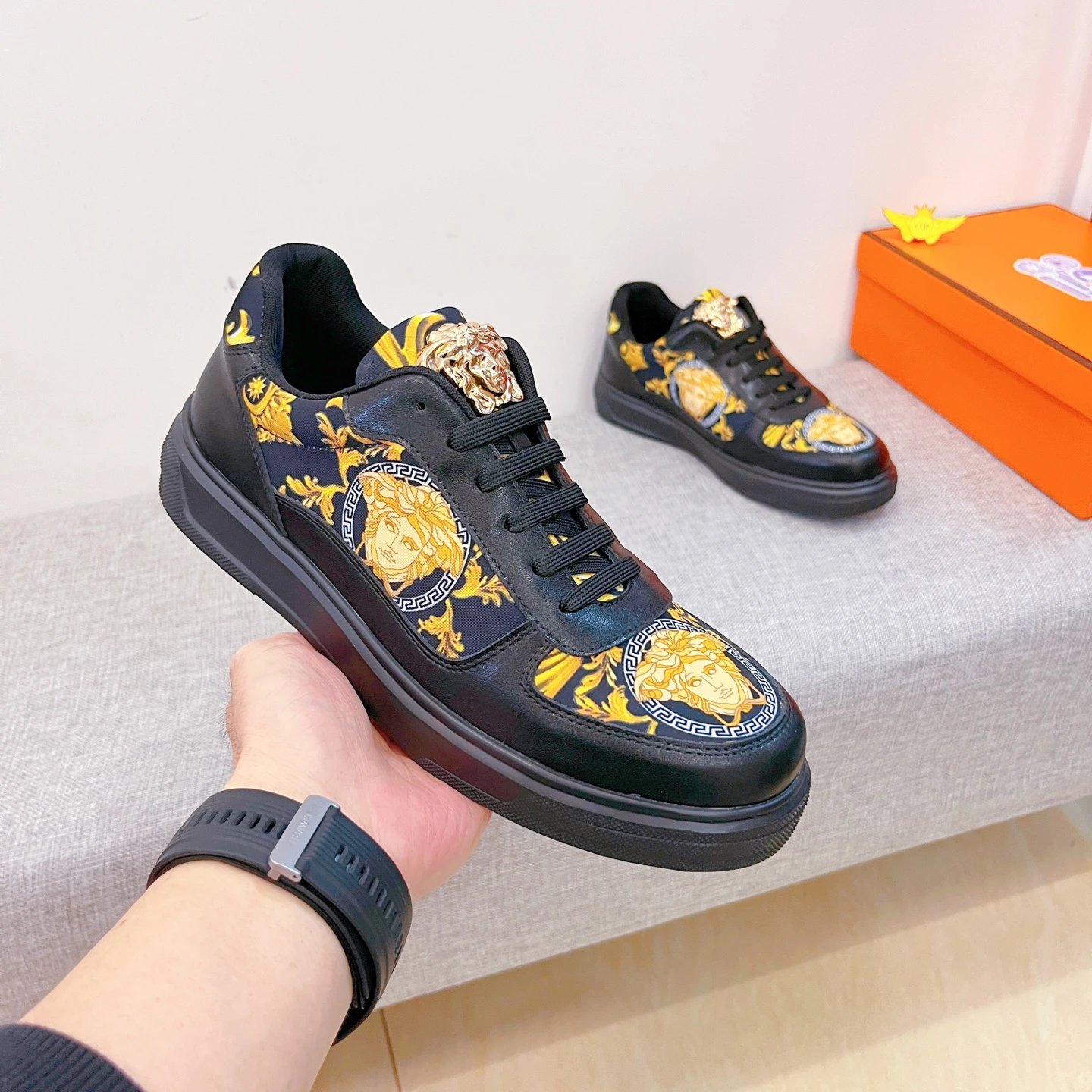 Baroque Leather Sneakers Black Gold with golden Baroque Medusa motifs - Gallery Image 3 - Detailed View