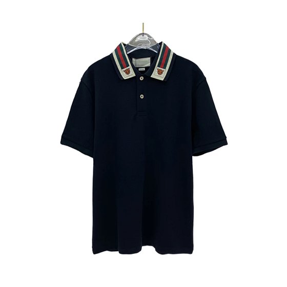Polo with tiger embroidery on the neckline