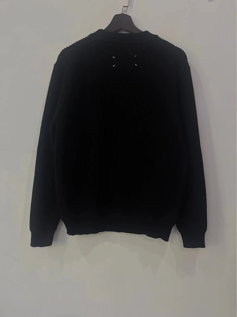 Black crewneck sweater