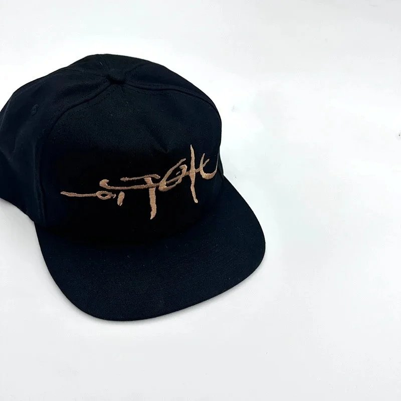 Black embroidered script cap