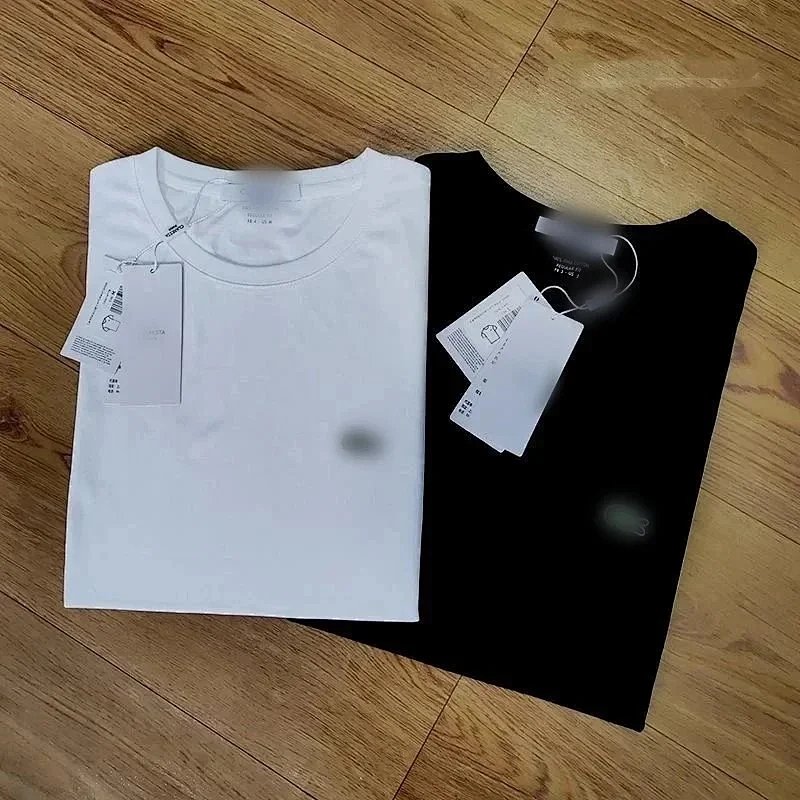 Plain white and black tees