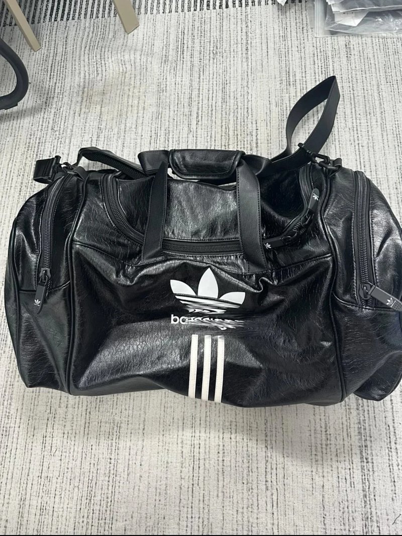 Adidas Originals black leather duffel bag