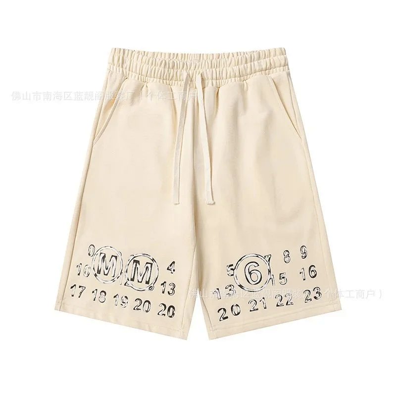 MM6 number print shorts