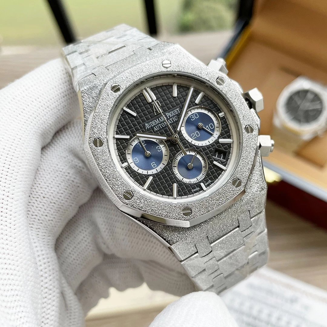 Silver case, Black dial, Steel bracelet, Blue subdial