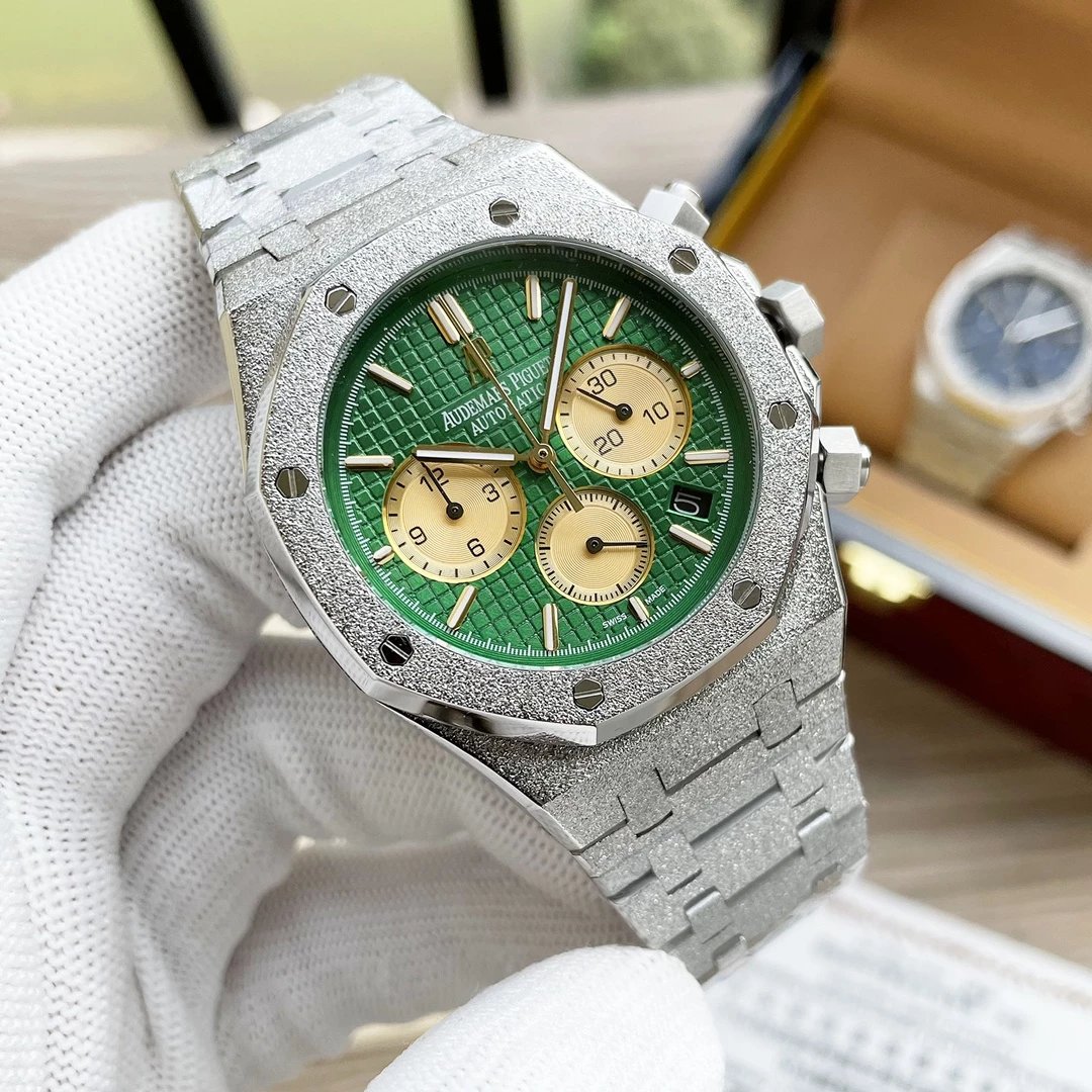 Silver case, Green dial, Steel bracelet, Yellow subdial