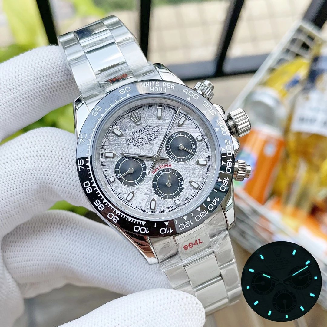 Silver case, baton index meteorite dial, steel band, black bezel