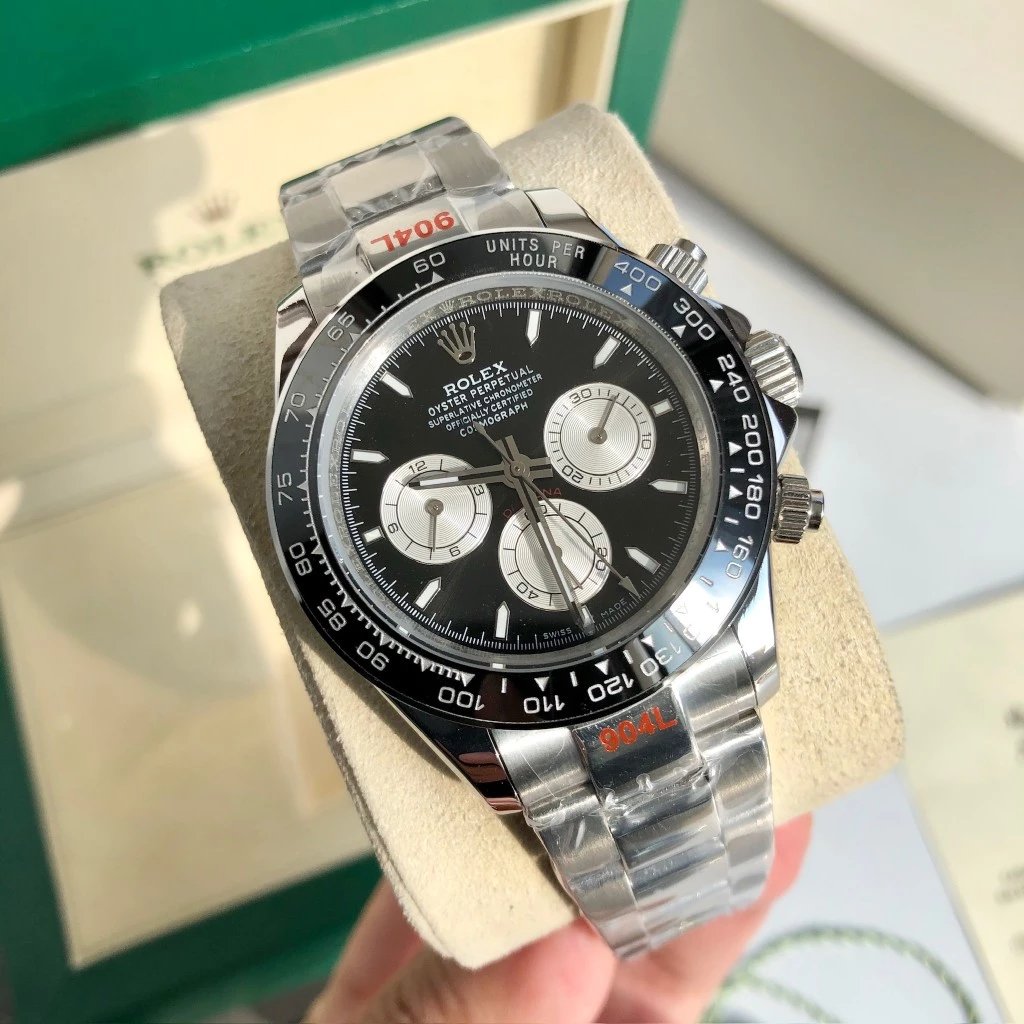 Silver case, baton index black dial, steel band, white subdial