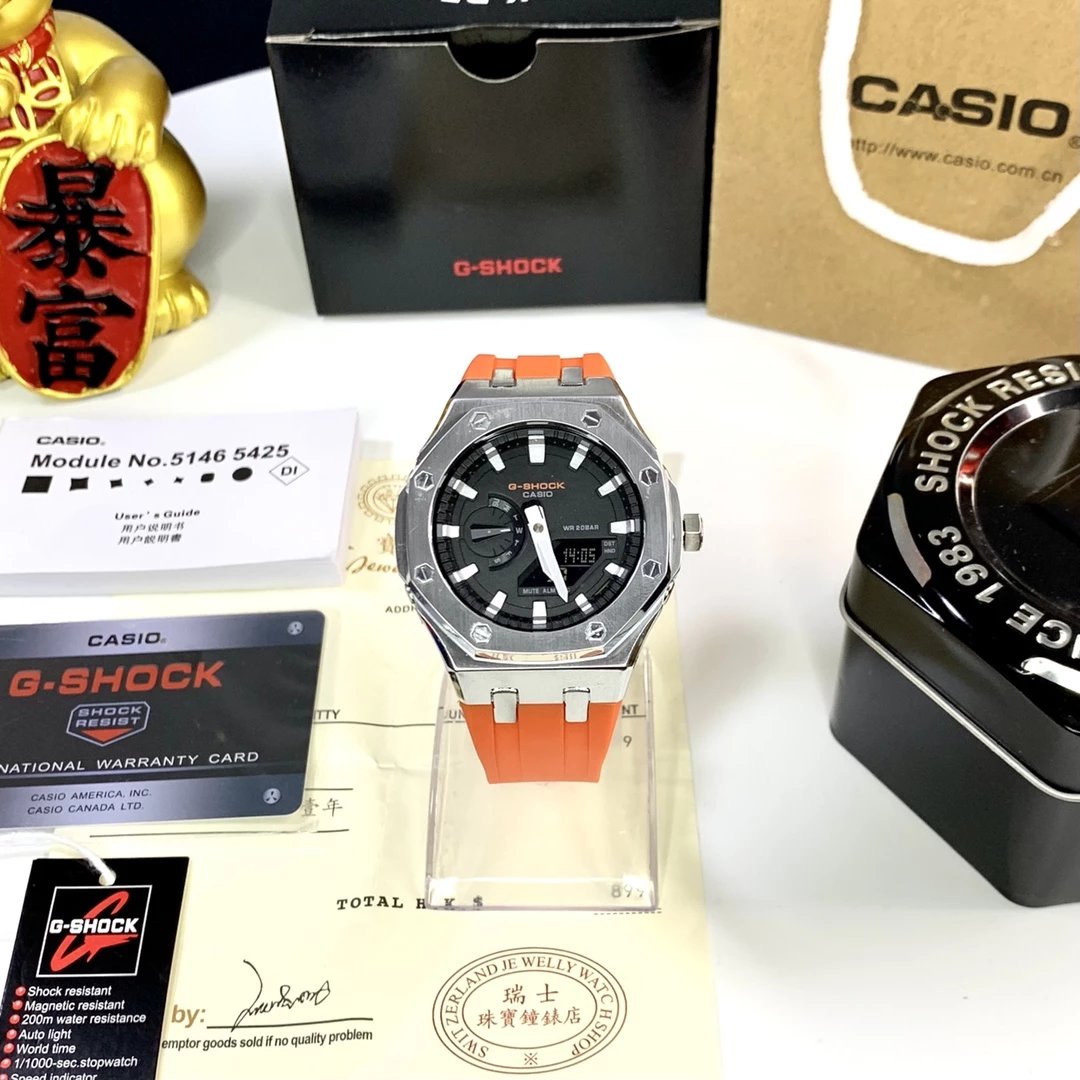 Silver Case · Black Dial with Orange Strap