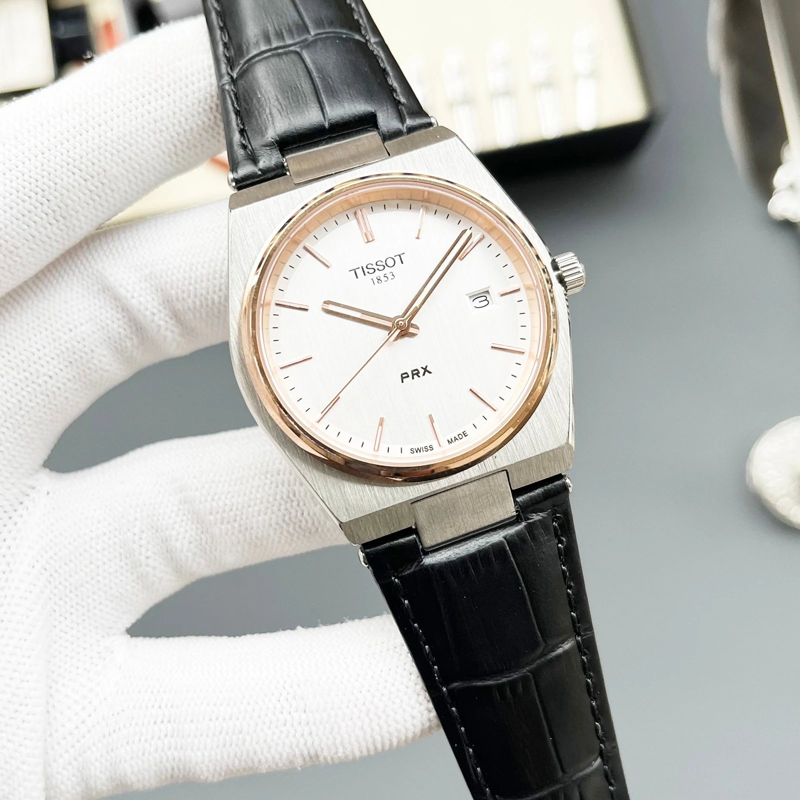 Two-tone rose gold case, White dial, Black leather strap