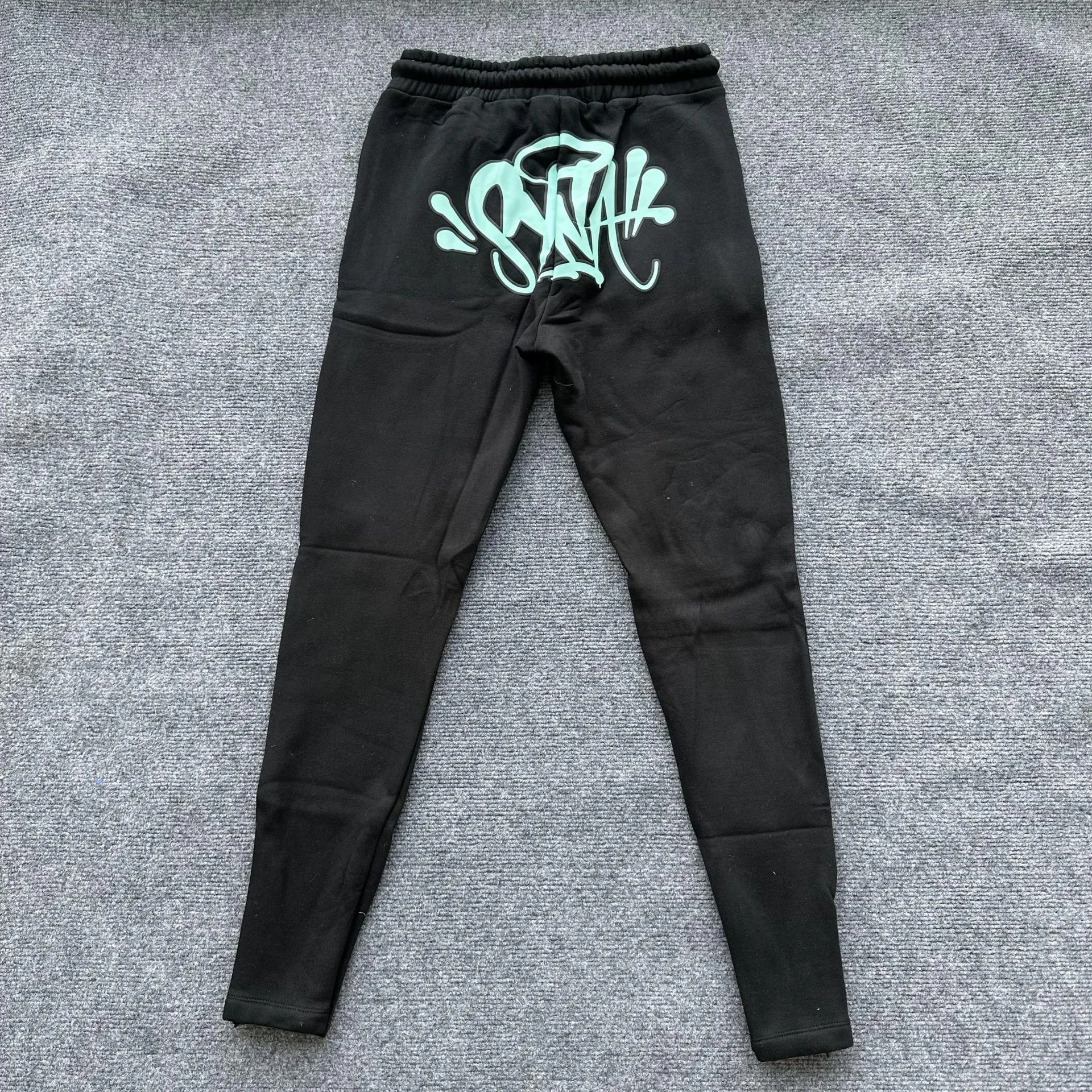 Synaworld Black Mint Green Graffiti Flare Sweatpants - rep spodnie
