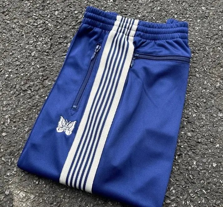 Needles-Inspired Black Track Pants with Butterfly Logo and Side Stripes