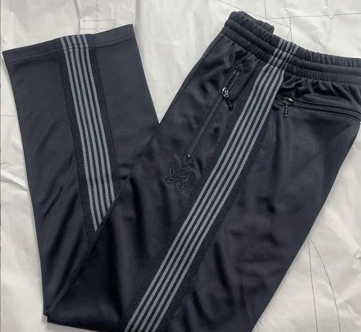 Needles-Inspired Black Track Pants with Butterfly Logo and Side Stripes