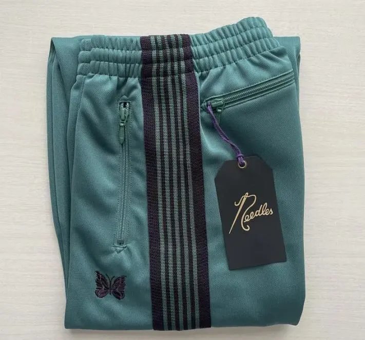 Needles-Inspired Black Track Pants with Butterfly Logo and Side Stripes