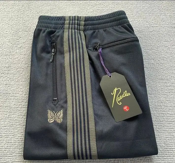 Needles-Inspired Black Track Pants with Butterfly Logo and Side Stripes