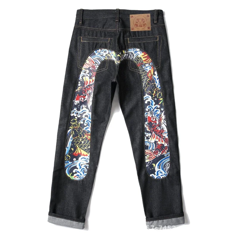 EVISU — Raw Selvedge Straight-Leg Jeans with Large "M" Print and Cuffed Hem