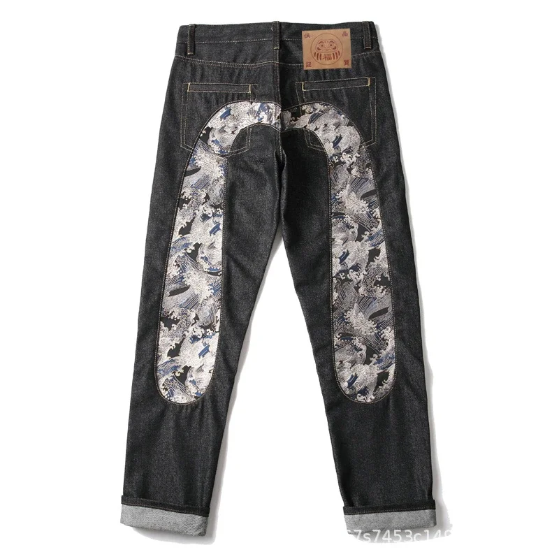 EVISU — Raw Selvedge Straight-Leg Jeans with Large "M" Print and Cuffed Hem