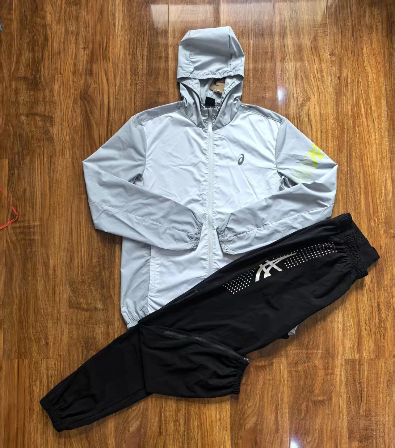 Grey and white jacket+black pants