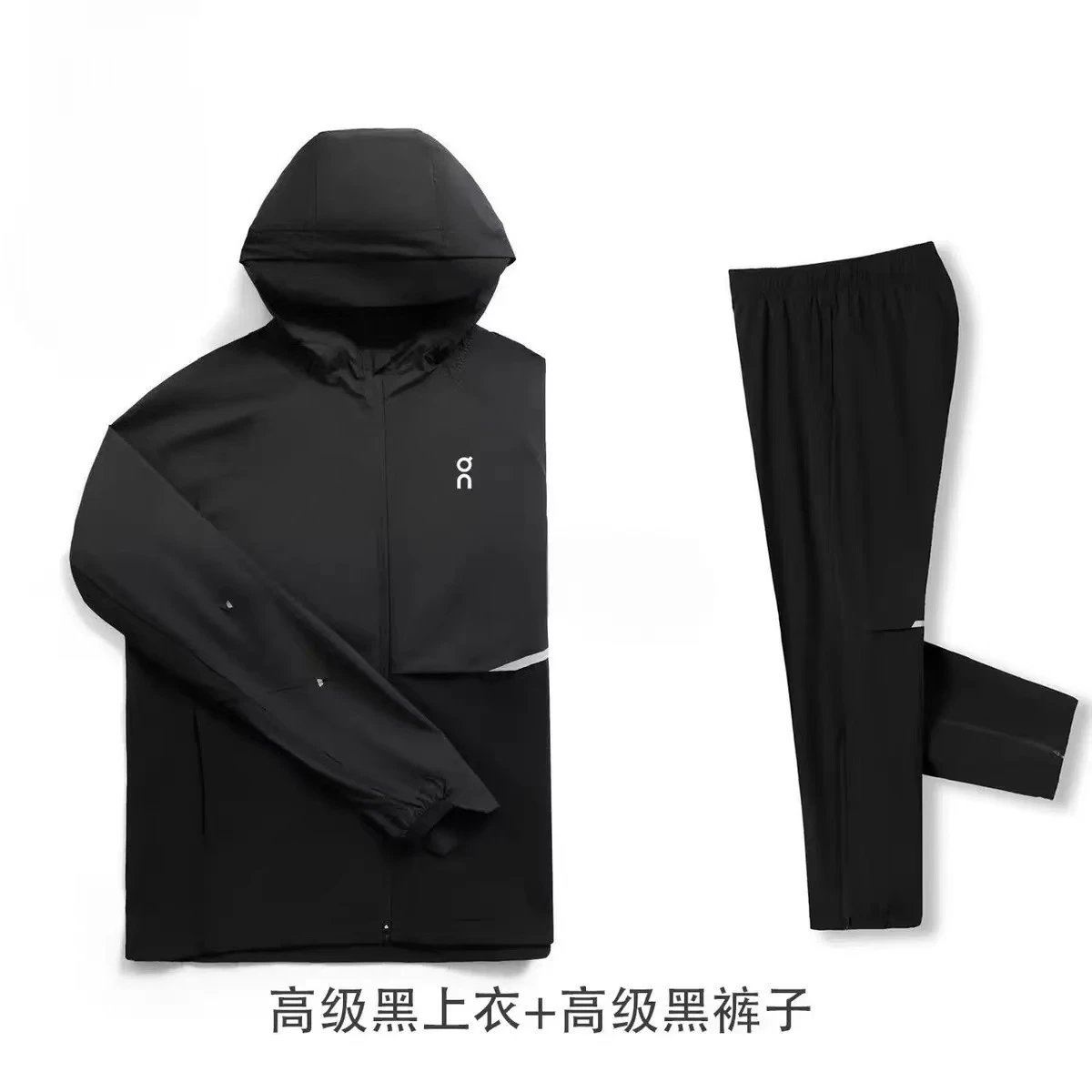 Black top (elastic cuffs) paired with black pants