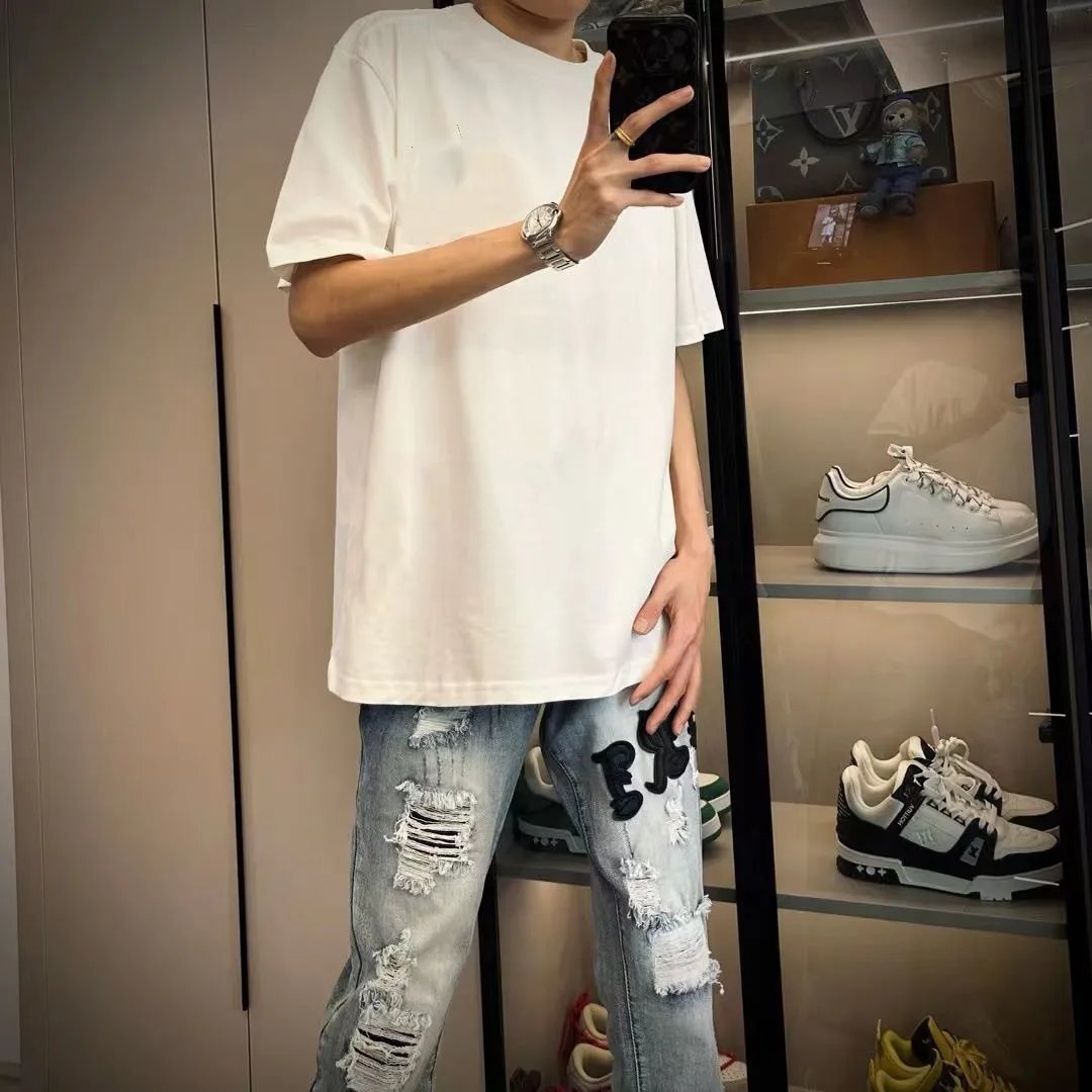 美式高街网红同款AM金标刺绣牛仔裤男百搭修身小脚学生直筒长裤