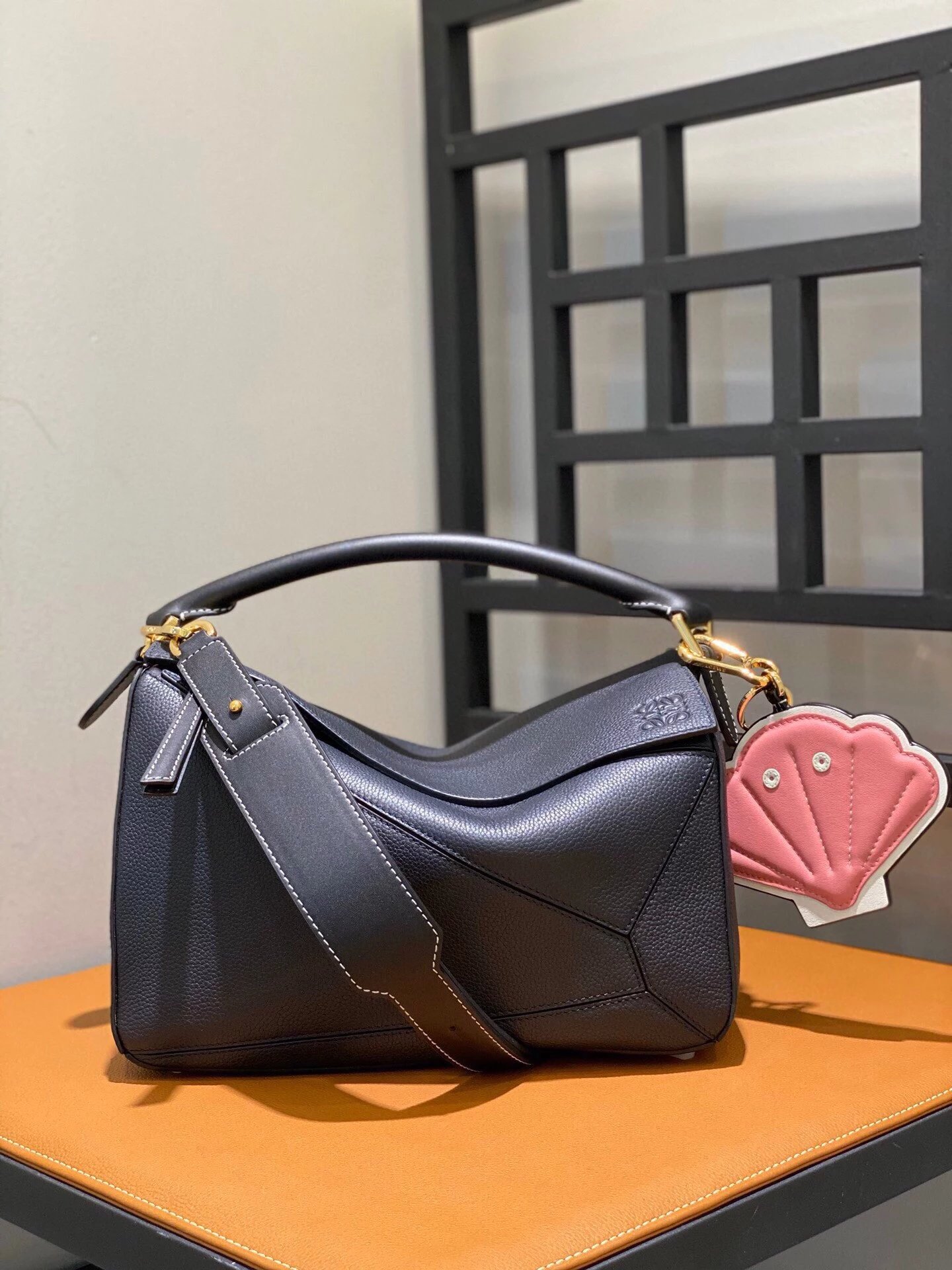 Loewe Puzzle Bag Black Grained Leather with Pink Shell Charm Handbag