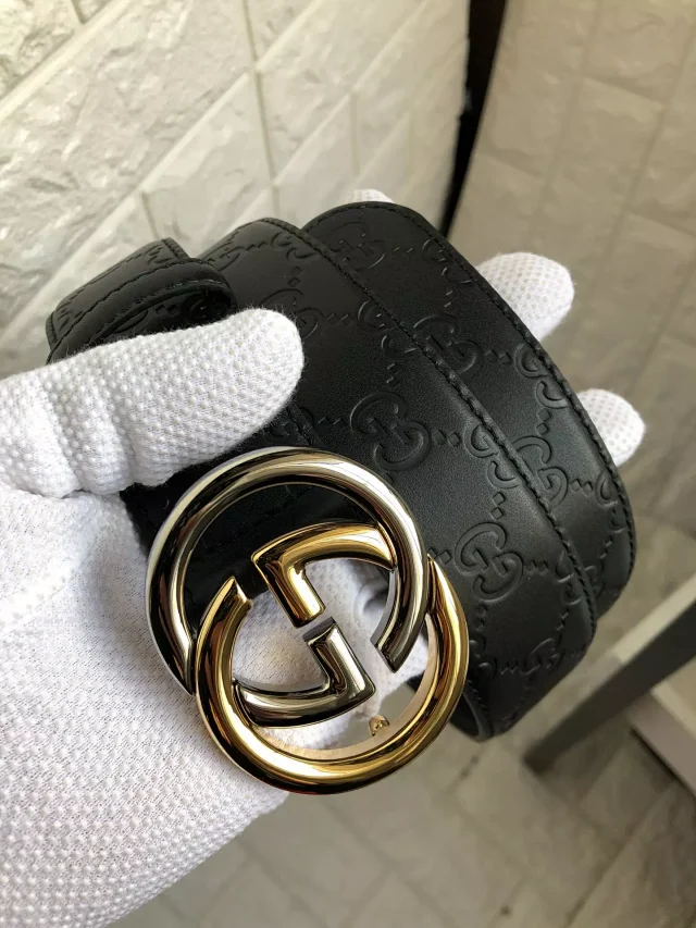 Gucci Belts Embossed GG leather belt with Double G buckle product detail image 1