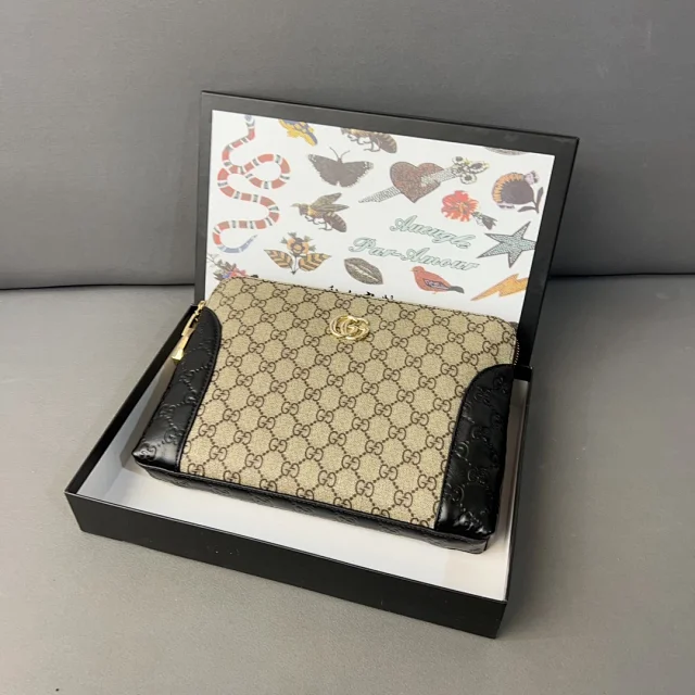 Gucci Wallets & Card Holders Black zip-around wristlet wallet with embossed Double G design product detail image 10