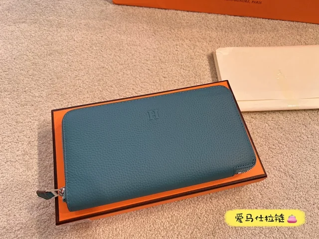 Hermès Wallets & Card Holders Pebbled Leather Zip-Around Wallet with Embossed H product detail image 1
