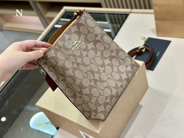 Coach Crossbody Bags Signature Monogram Zip Pouch Bag product detail image 1
