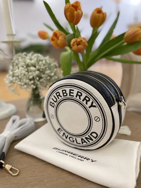 Burberry Logo Print Round Crossbody Bag White and Black - 1