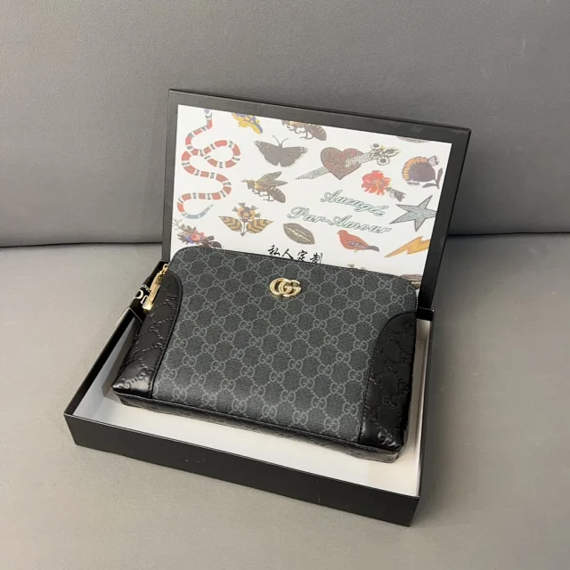 Gucci Wallets & Card Holders Black zip-around wristlet wallet with embossed Double G design product detail image 11