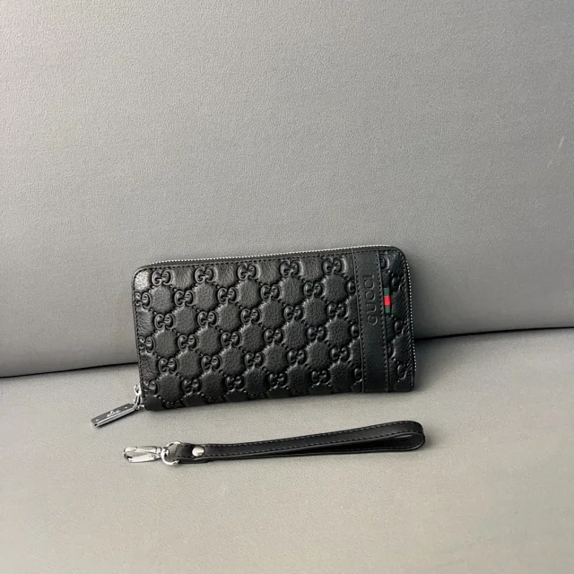 Gucci Wallets & Card Holders Black zip-around wristlet wallet with embossed Double G design product detail image 3