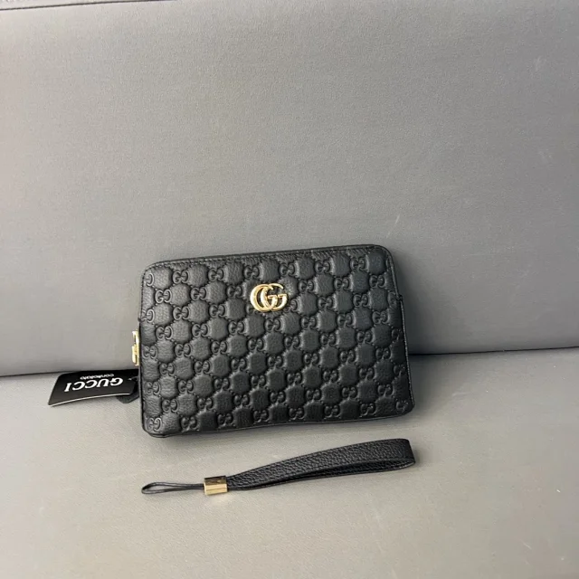 Gucci Wallets & Card Holders Black zip-around wristlet wallet with embossed Double G design product detail image 6
