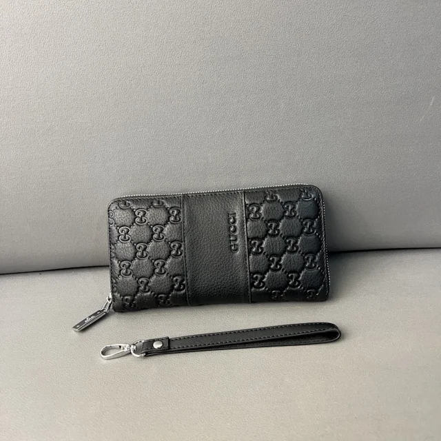 Gucci Wallets & Card Holders Black zip-around wristlet wallet with embossed Double G design product detail image 2