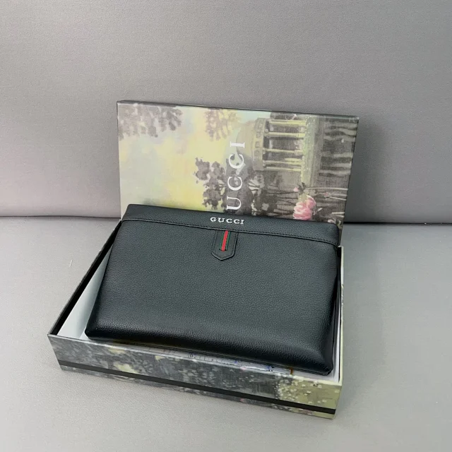 Gucci Wallets & Card Holders Black zip-around wristlet wallet with embossed Double G design product detail image 14
