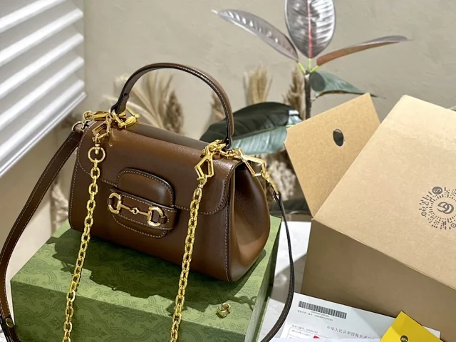 Gucci Shoulder Bags Top-Handle Bag with Chain Strap and Horsebit Detail product detail image 1