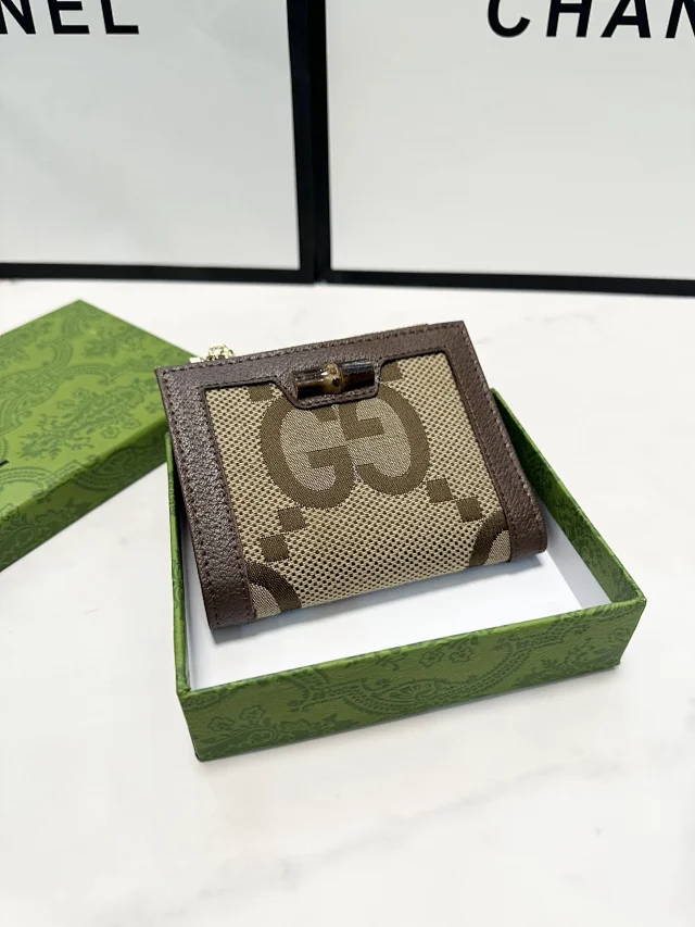 Gucci Wallets & Card Holders Black zip-around wristlet wallet with embossed Double G design product detail image 13