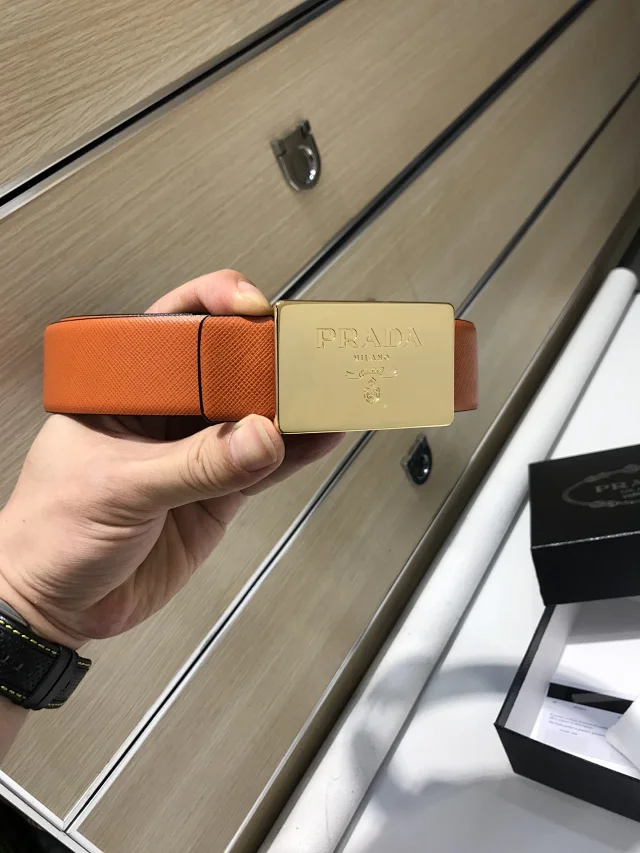 Prada Belts Textured leather belt with rectangular logo buckle product detail image 1