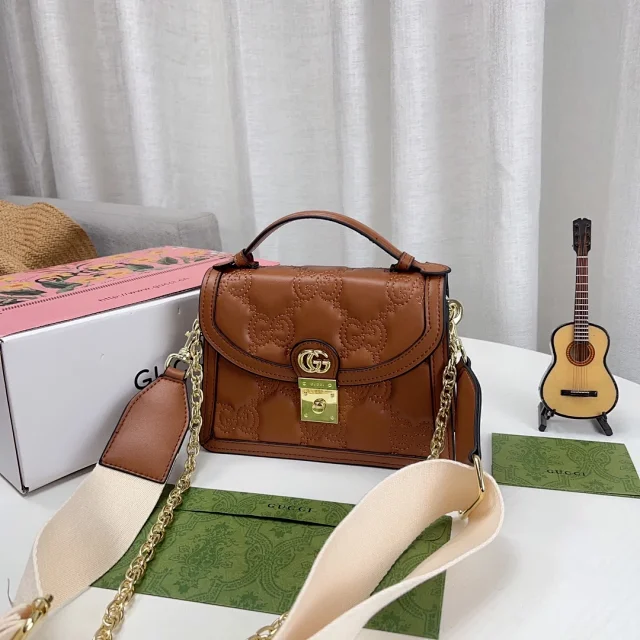 Gucci Crossbody Bags Top-handle flap bag with Double G hardware product detail image 1