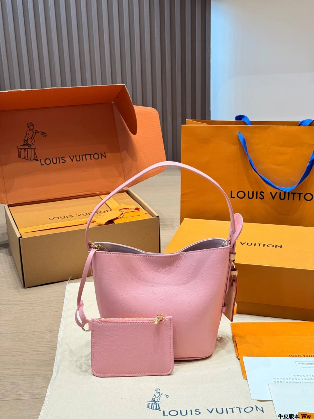 Louis Vuitton Ostrich Leather Bucket Bag in Pink with Matching Pouch Handbags