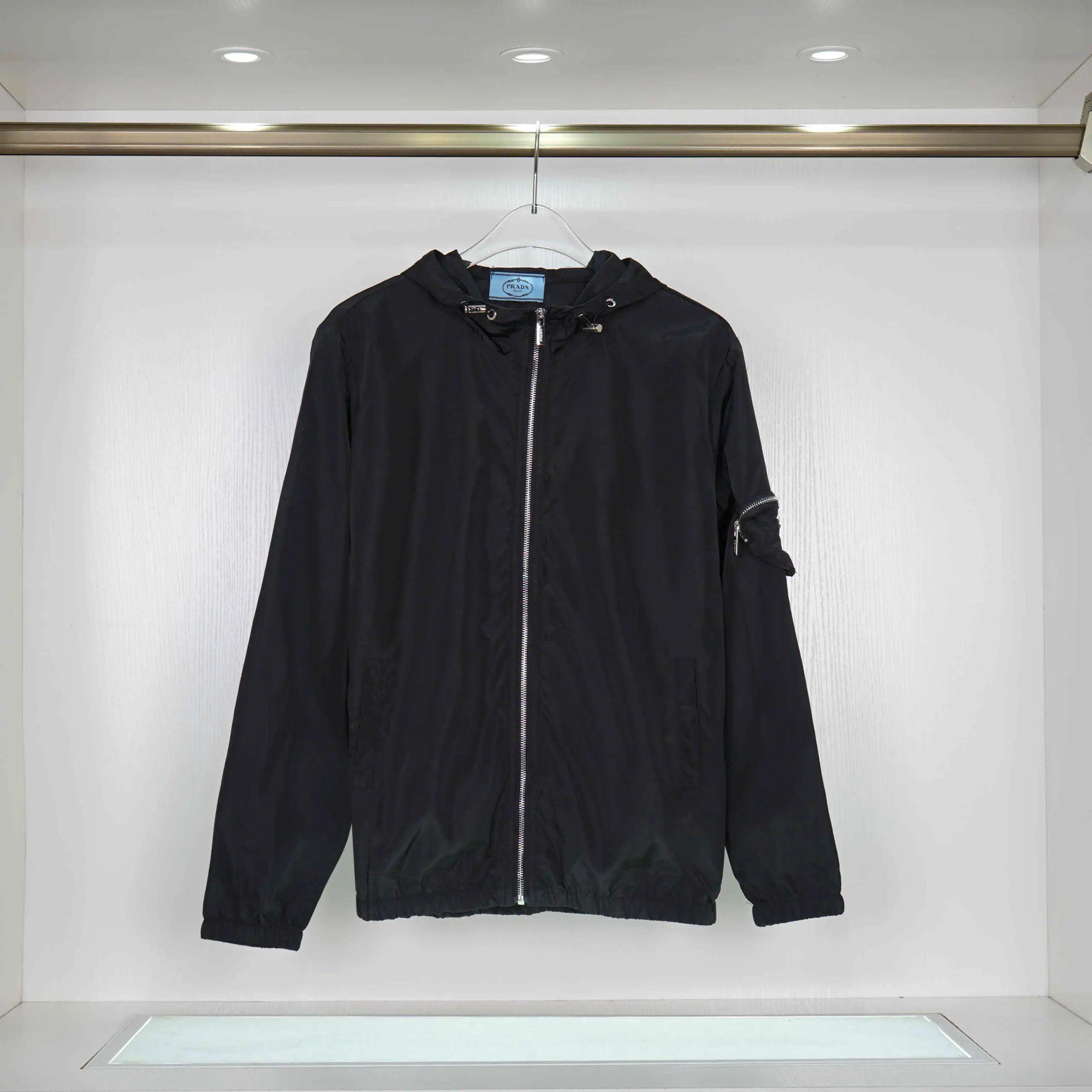 Prada Jackets Hooded zip-up windbreaker jacket — 28
