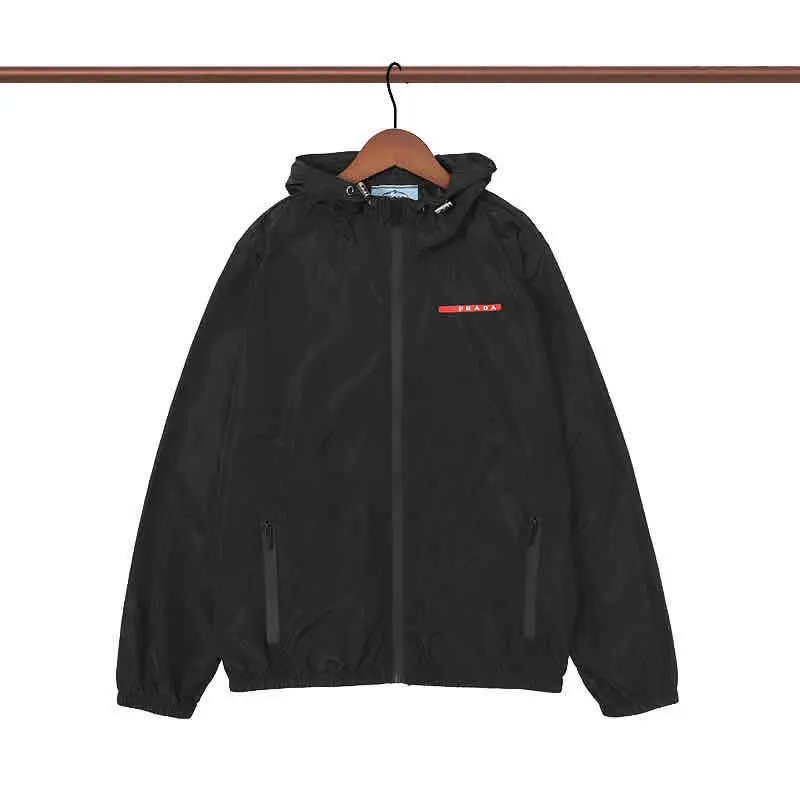 Prada Jackets Hooded zip-up windbreaker jacket — 33