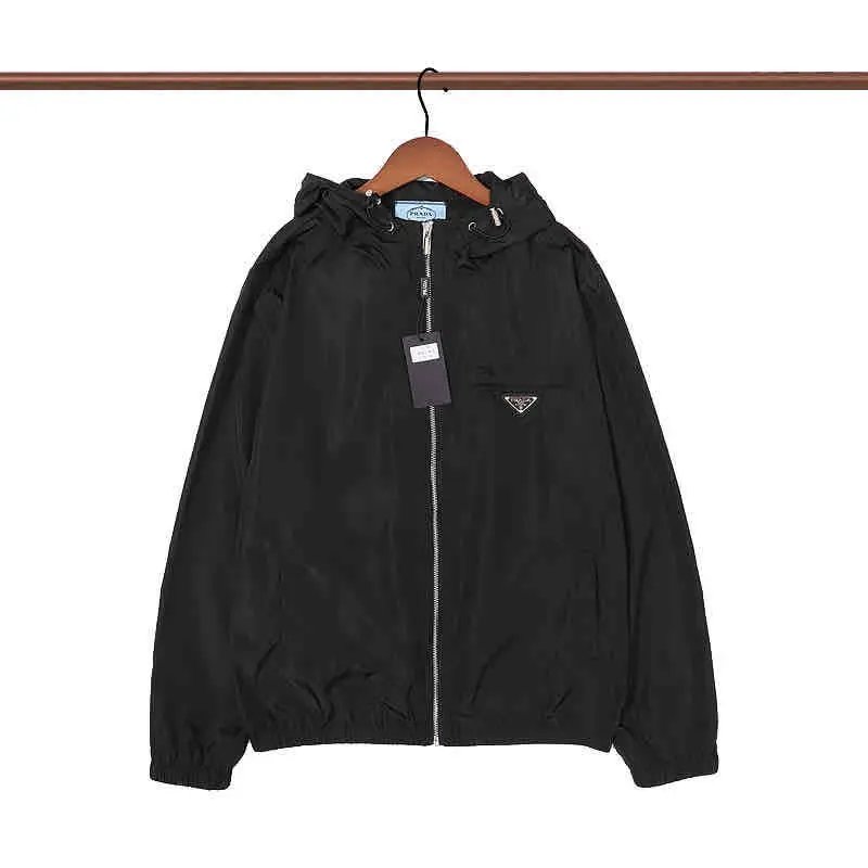 Prada Jackets Hooded zip-up windbreaker jacket — 37