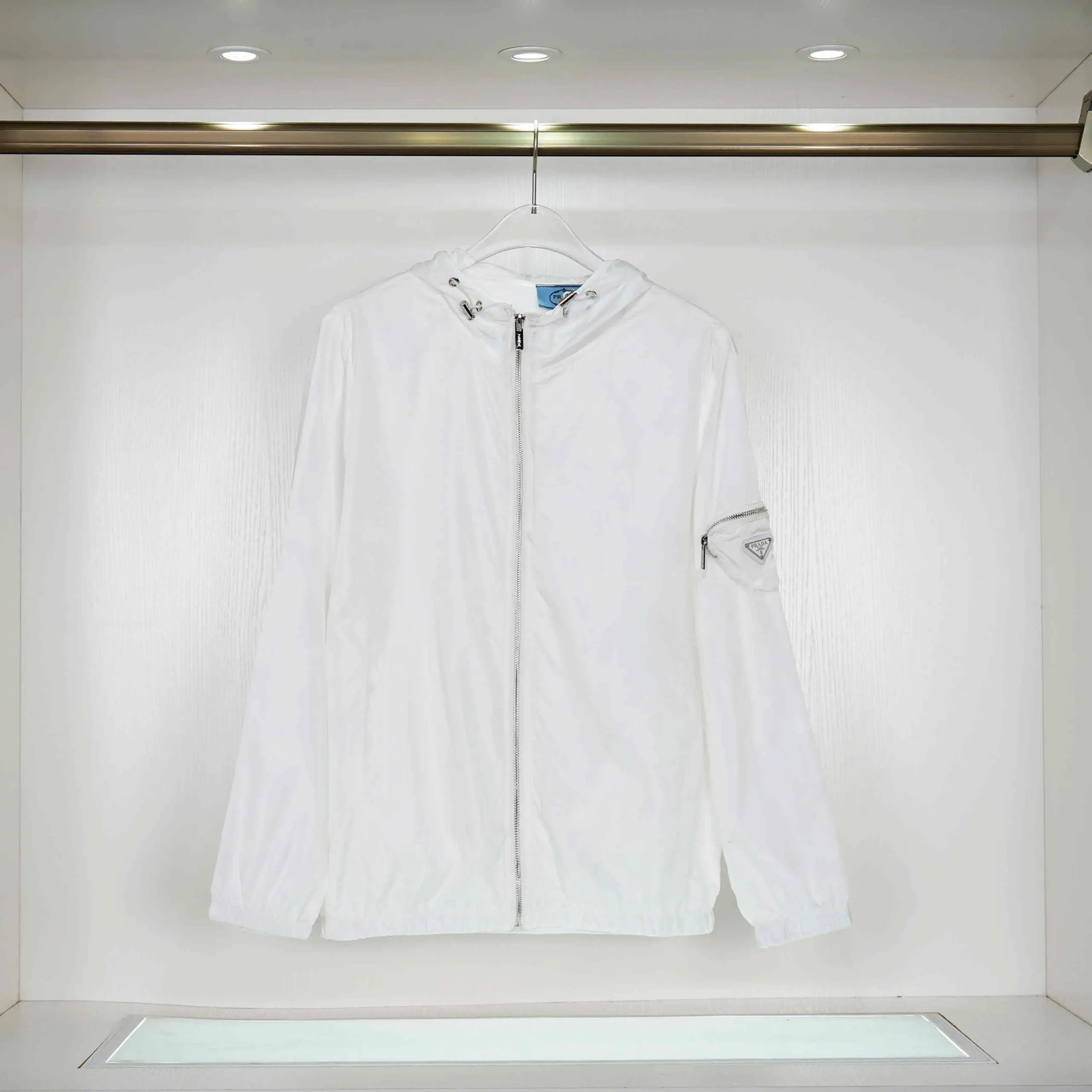 Prada Jackets Hooded zip-up windbreaker jacket — 29