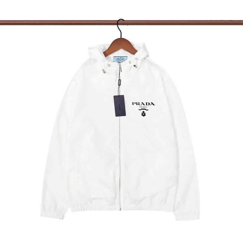 Prada Jackets Hooded zip-up windbreaker jacket — 34