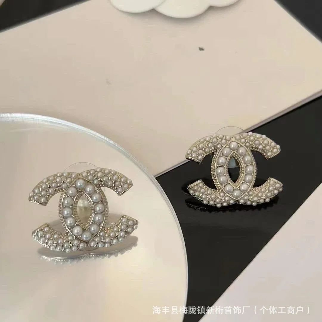 Chanel CC Silver Ear