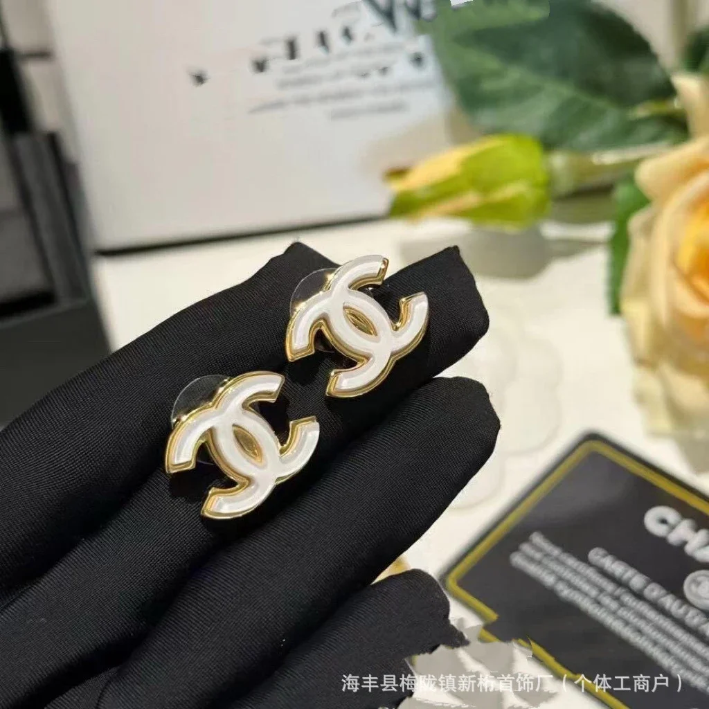 Chanel CC White Earr