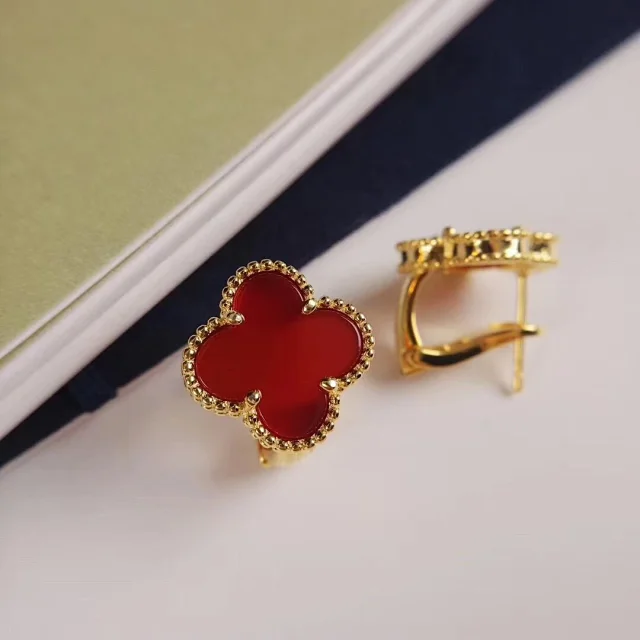 Van Cleef & Arpels Jewelry Pendant Necklaces with Clover, Butterfly and Cube Designs product detail image 15