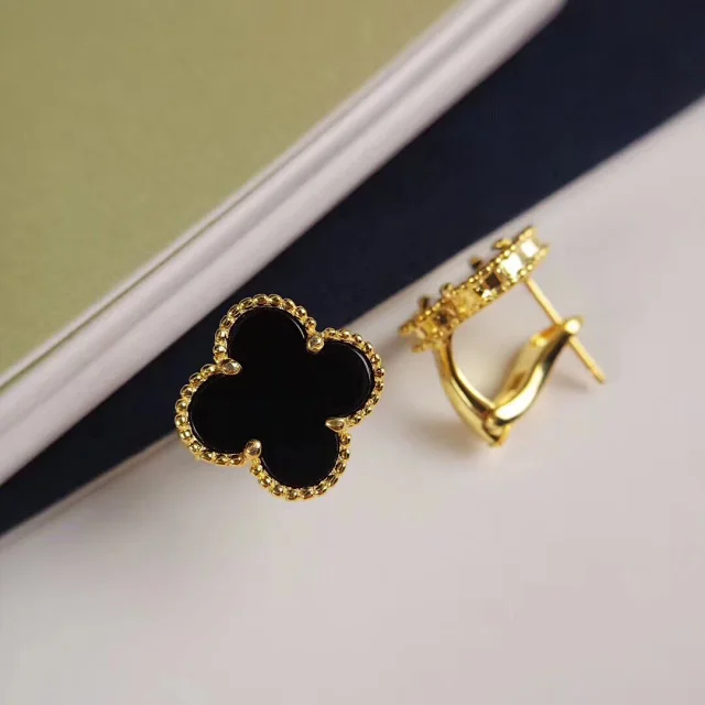 Van Cleef & Arpels Jewelry Pendant Necklaces with Clover, Butterfly and Cube Designs product detail image 14