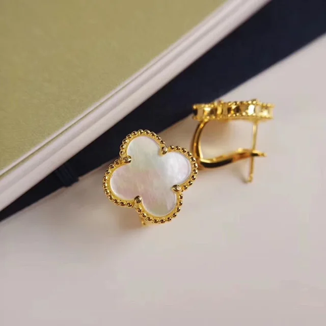 Van Cleef & Arpels Jewelry Pendant Necklaces with Clover, Butterfly and Cube Designs product detail image 13