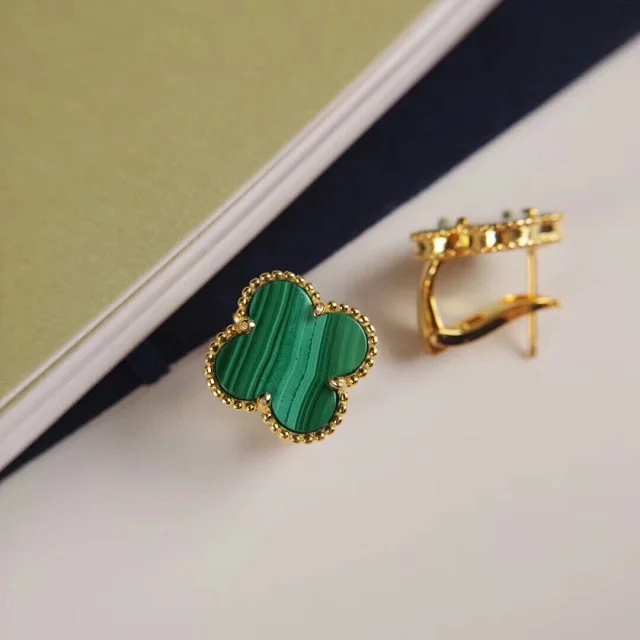 Van Cleef & Arpels Jewelry Pendant Necklaces with Clover, Butterfly and Cube Designs product detail image 11